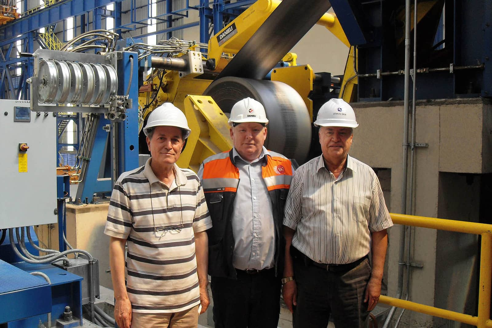 First Coil of Atakaş Continuous Pickling line, from left Mr. Murtez Tulukoglu (ATAKAS Plant Manager), Mr. Roy Houston (Danieli Site Manager), Mr. Tuncer Cakici (ATAKAS Project Director) 
