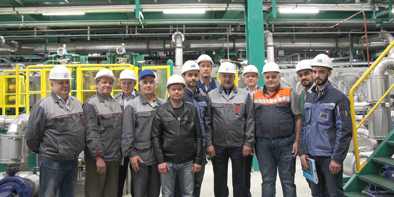 Souvenir picture from LMZ plant. <br> From left to right: Terentyev S.N. (Lead Power Engineer), Solomin A.V. (Head of Capital Construction), Kolyvanov I.V. (Deputy Chief Engineer), Filippov S.V. (Deputy Chief Engineer on New Tech), Peretyagin O.V. (Power Engineer), Shamrey V.A. (General Director MetPromStroy), Ogorodov I.A. (Project Manager for LMZ), Deineko A.D. (General Director), Chistyakov I.P. (Technical Director MC LMC), Sabbadini M. (Site & Commissioning Manager), Pankin I.P. (Director of Legal Affairs), Shamrey I.A. (Project Manager for MetPromStroy).