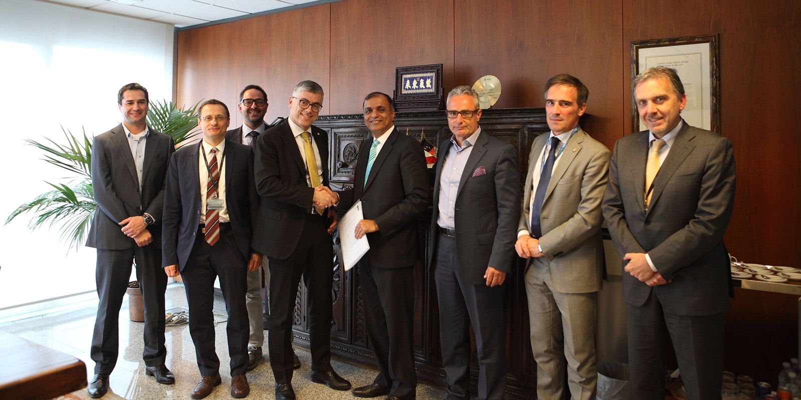 Hands shaking between Mr. Aameir Alihussain / Managing Director of BSRM and Mr. Luigi Morsut / EVP of Danieli Centro Met.